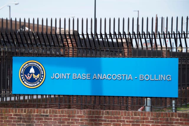 <p>he front gate of Joint Base Anacostia-Bolling is viewed in Washington, DC, on March 27, 2018</p>