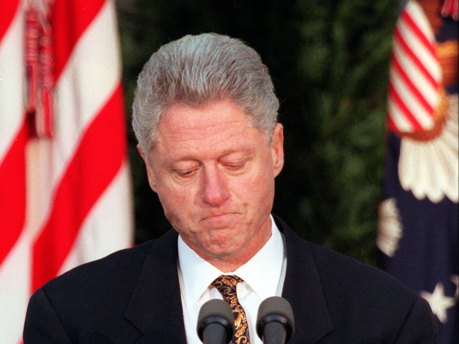 Bill Clinton apologises to the nation from the Rose Garden of the White House on 11 December 1998 in Washington, DC