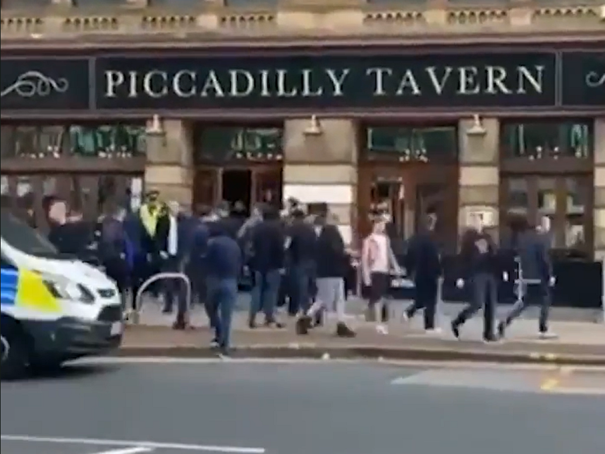 Manchester United and Leeds fans clash in street brawl Manchester United and Leeds fans clash in street brawl