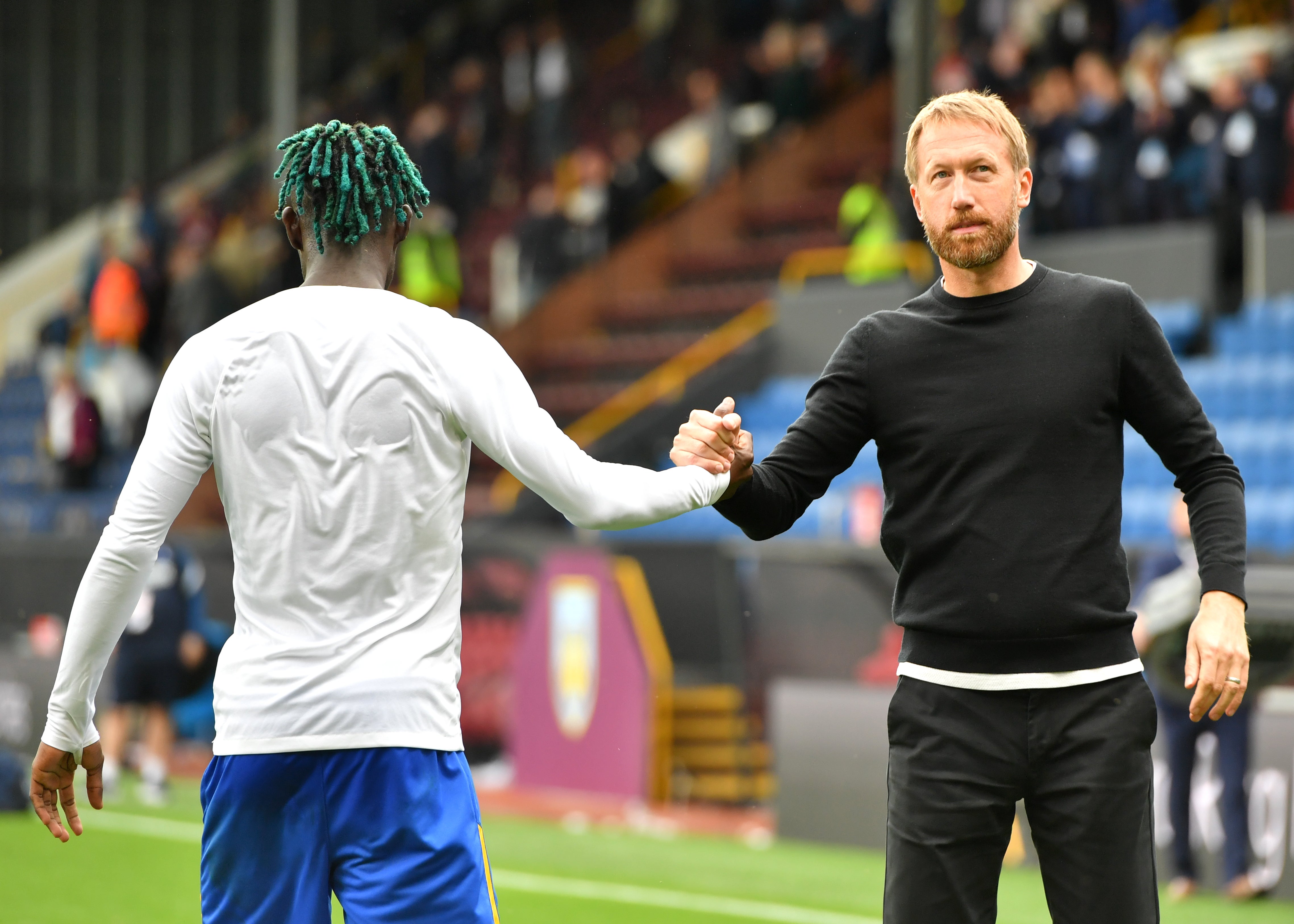 Brighton’s Yves Bissouma greets manager Graham Potter after the final whistle (Anthony Devlin/PA)