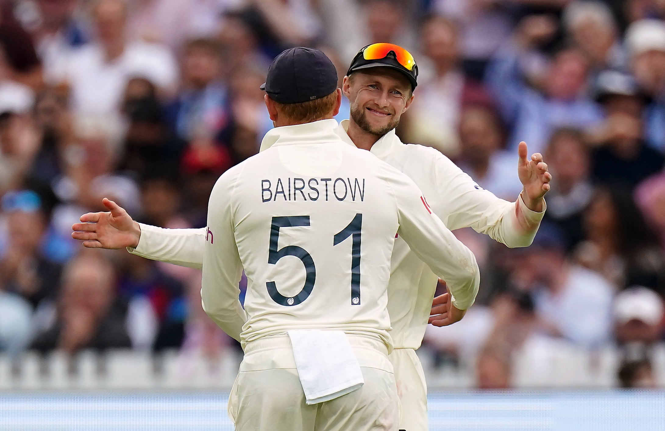 England’s Jonny Bairstow, left, celebrates with team-mate Joe Root (Zac Goodwin/PA)