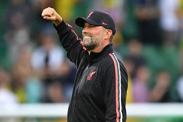 <p>Jurgen Klopp celebrates his Liverpool side’s win at Norwich</p>