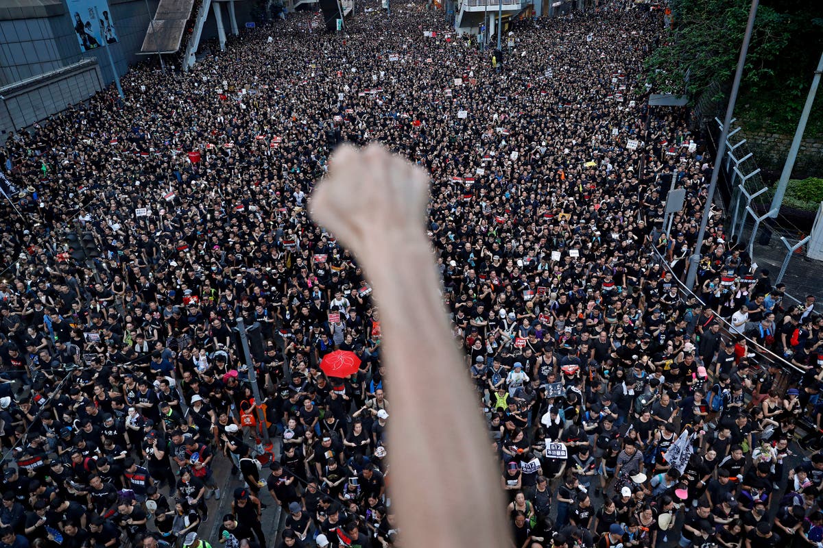 Hong Kong democracy group behind massive protests disbands Hong Kong democracy group behind massive protests disbands