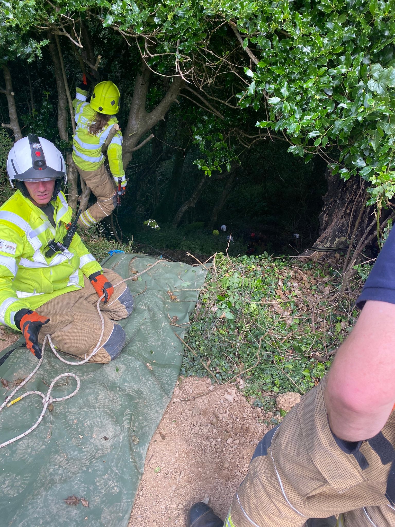 Bodmin Police rescued the woman from 70ft down a ravine