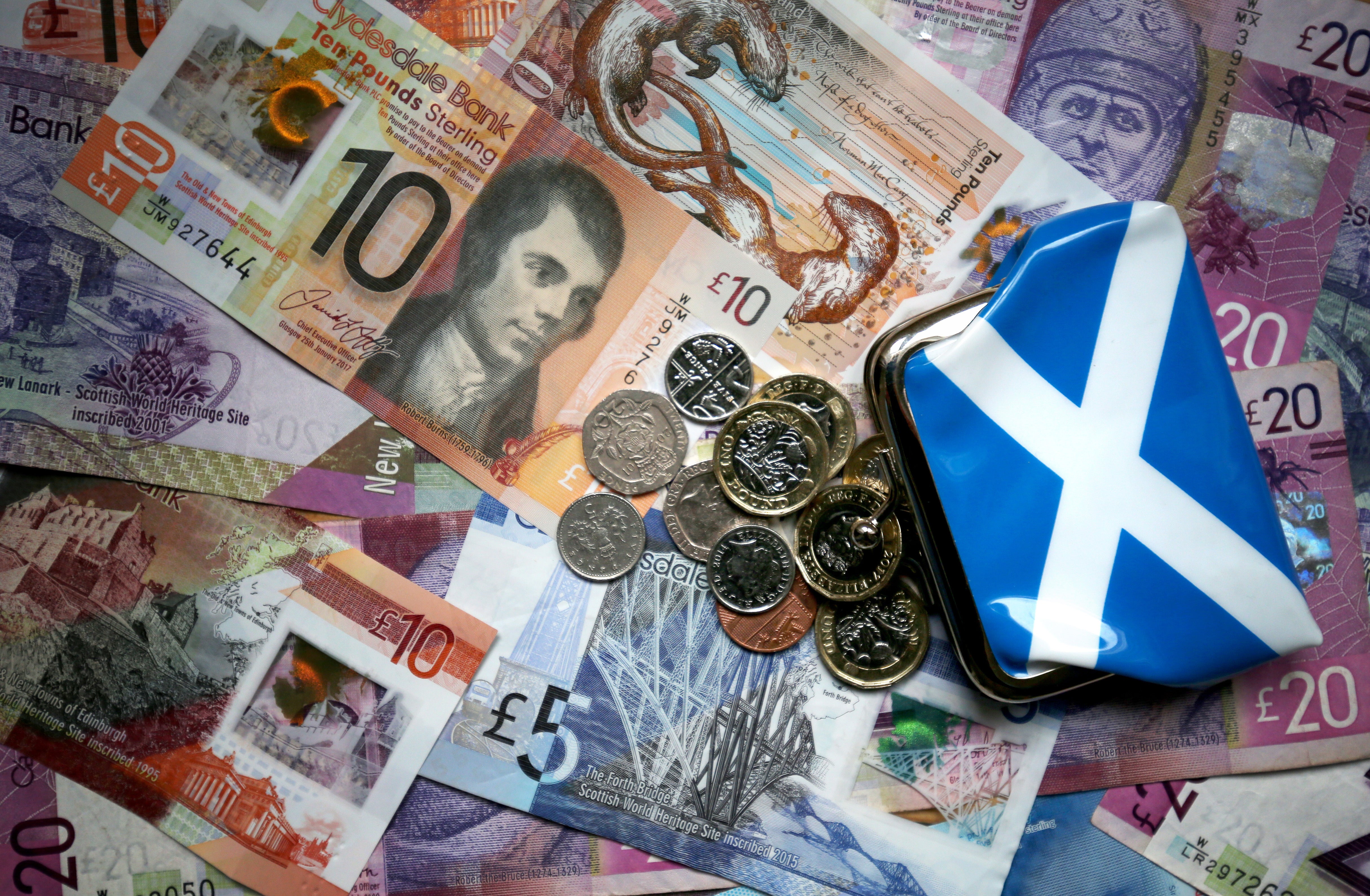 About three-quarters of Scottish firms are planning a pay review (Jane Barlow/PA)