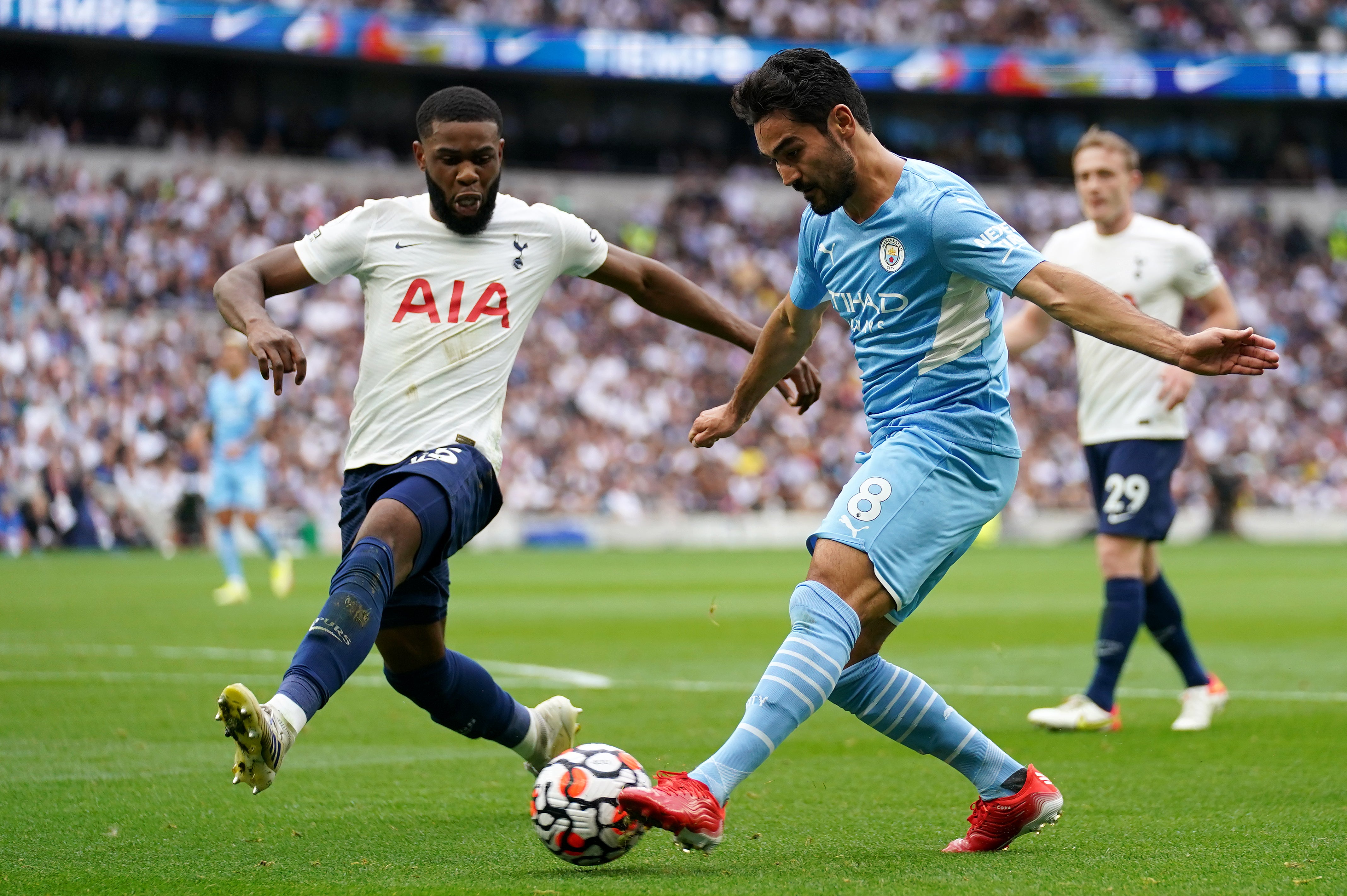 Ilkay Gundogan (right) was injured after a late collision (Nick Potts/PA)