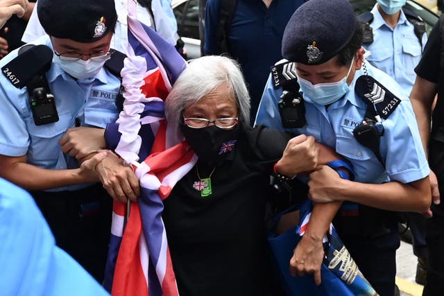 <p>Alexandra Wong, known as Grandma Wong, is taken away by police at a protest last month to mark the 24th anniversary of Hong Kong’s handover from Britain</p>