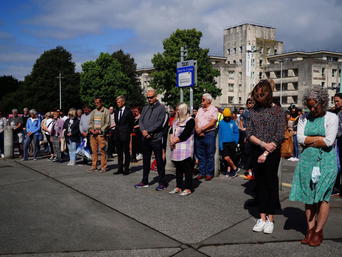Plymouth shooting: City holds minute silence as tributes paid to victims