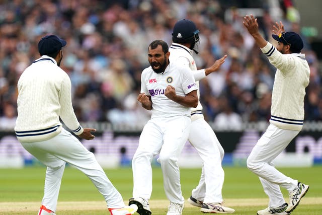 <p>Mohammed Shami (second left) celebrates dismissing England’s Dom Sibley for India in the Test series in August </p>