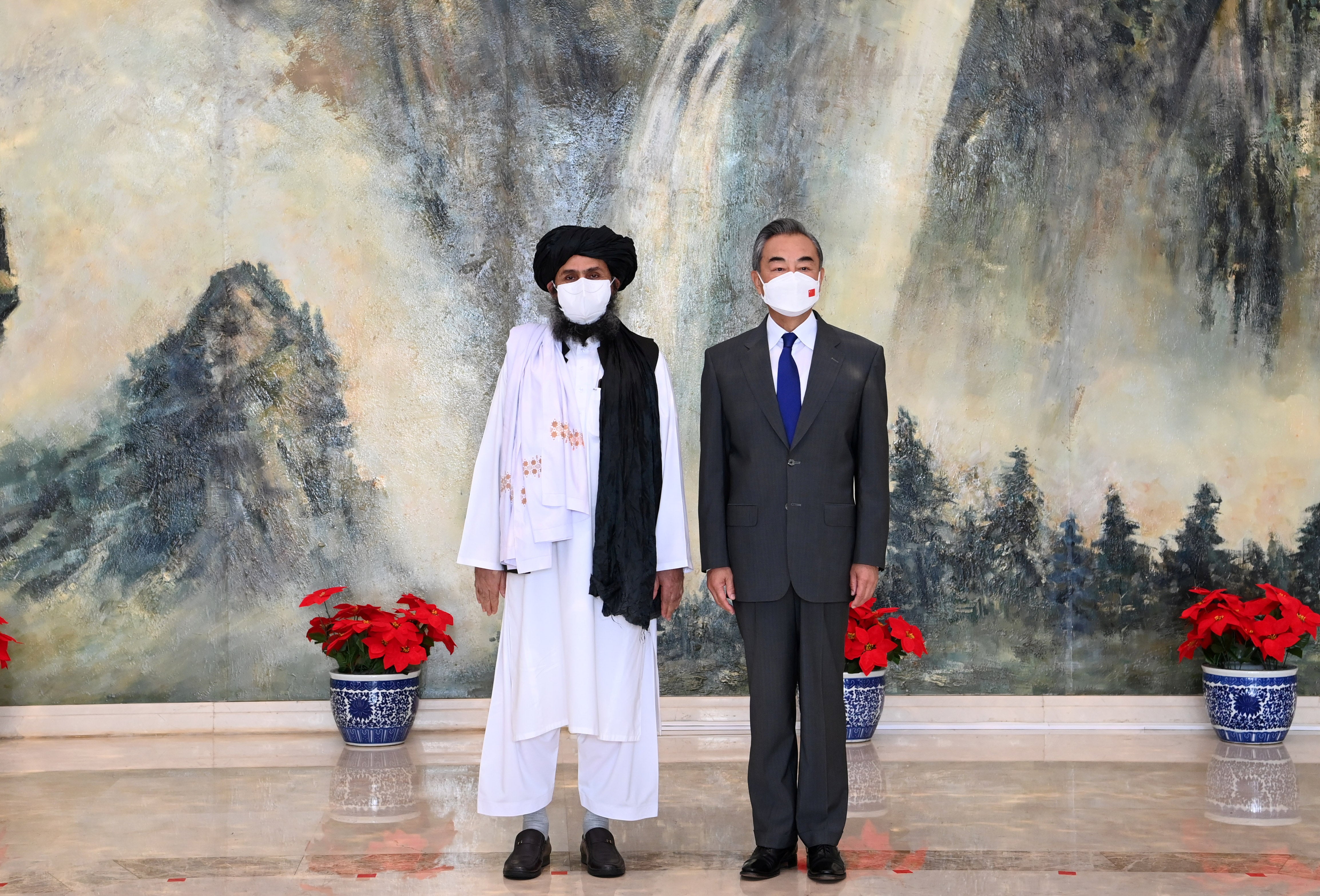 <p>Chinese State Councilor and Foreign Minister Wang Yi meets with Mullah Abdul Ghani Baradar in July</p>