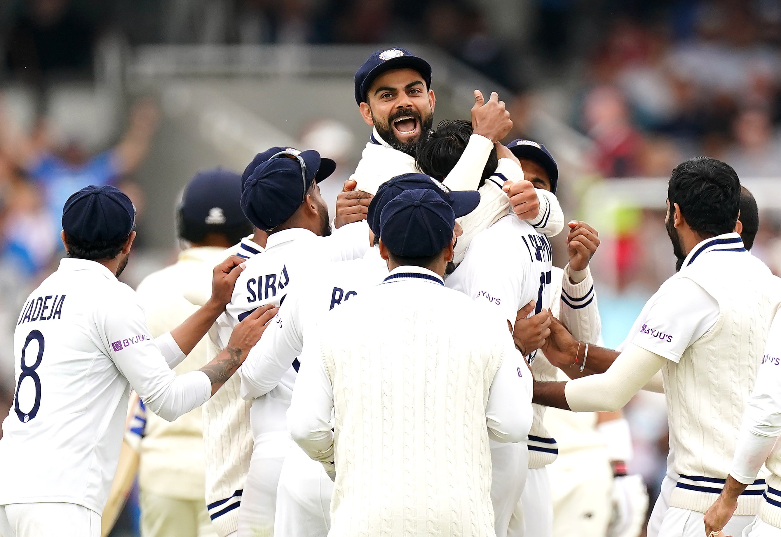 India’s Virat Kohli (top) celebrates the wicket of Jonny Bairstow (Zac Goodwin/PA).