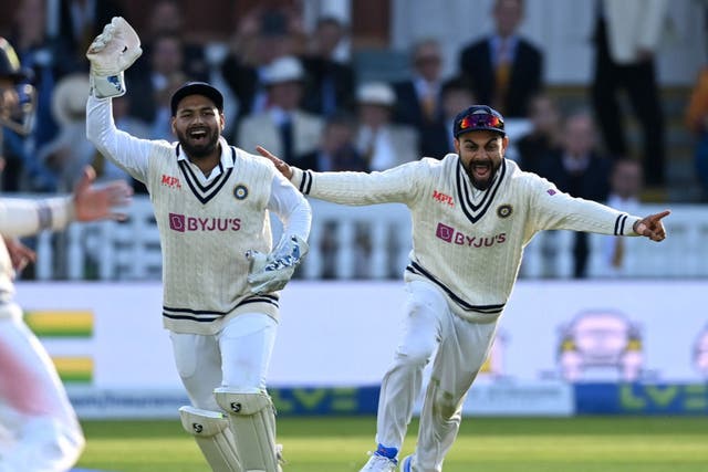 <p>Rishabh Pant and Virat Kohli of India celebrate the final wicket </p>