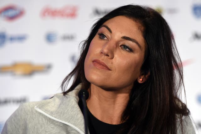 <p>US Soccer team goalkeeper Hope Solo talks to the press during the US Women's National Team World Cup Media Day on May 27, in New York City</p>