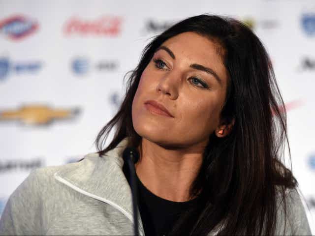 <p>US Soccer team goalkeeper Hope Solo talks to the press during the US Women's National Team World Cup Media Day on May 27, in New York City</p>