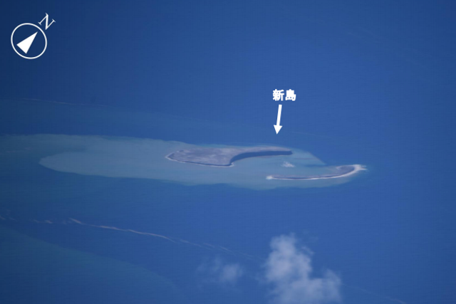 <p>Aerial image of new island formed in Pacific Island, 745 miles south of Tokyo, following an undersea volcanic eruption</p>