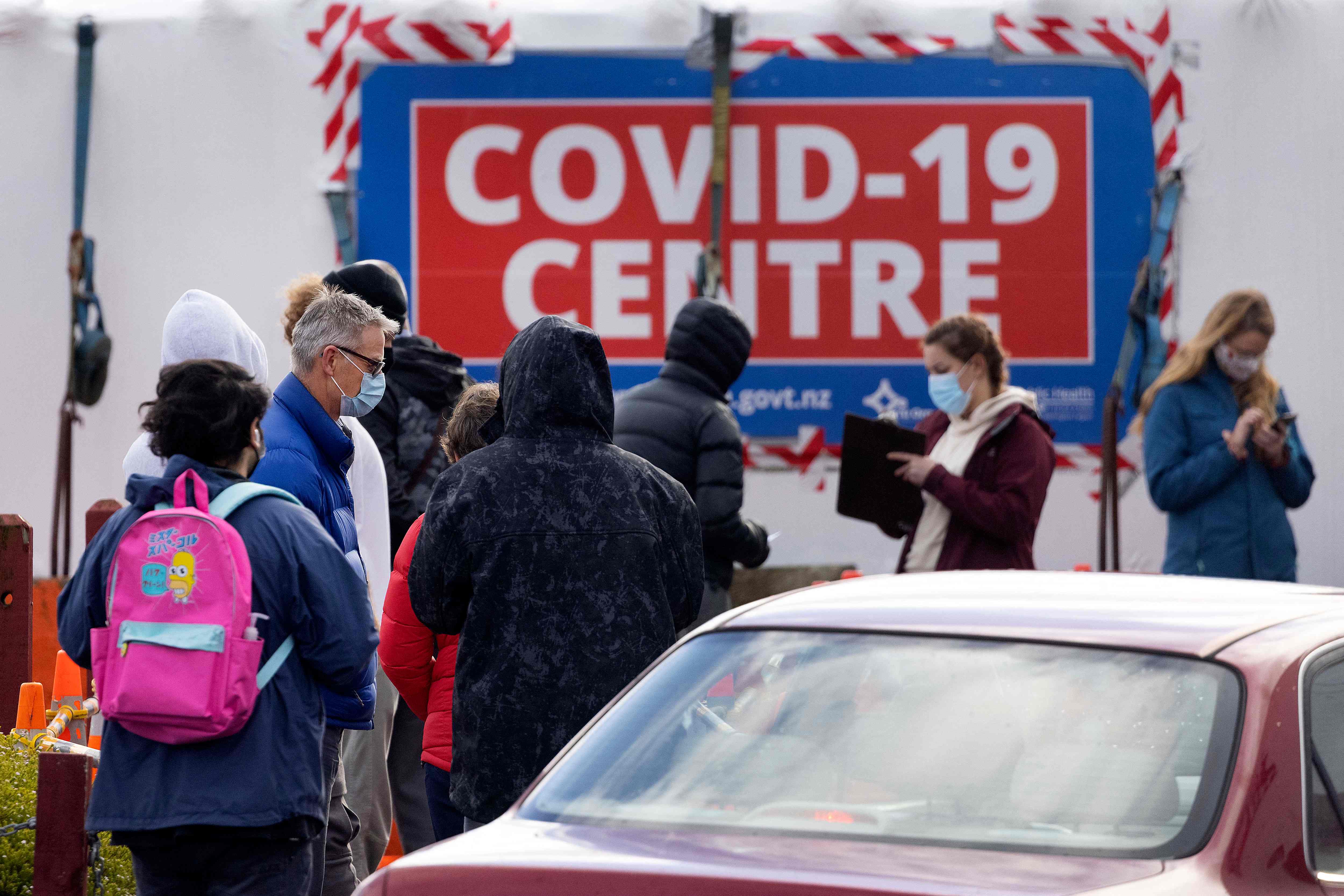 People visit a Covid-19 testing station during a nationwide lockdown in Wellington on 18 August 2021