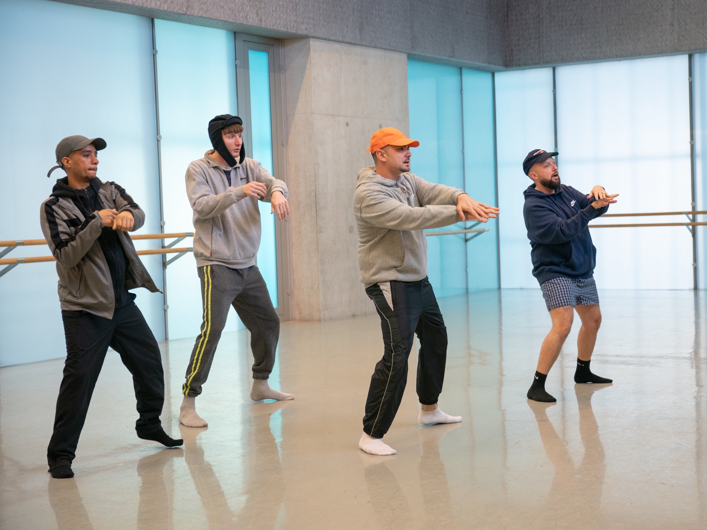 The Kurupt FM gang (freom left, Dan Sylvester, Steve Stamp, Allan Mustafa, Hugo Chegwin) learn a dance routine at the behest of record executives in ‘Big in Japan'