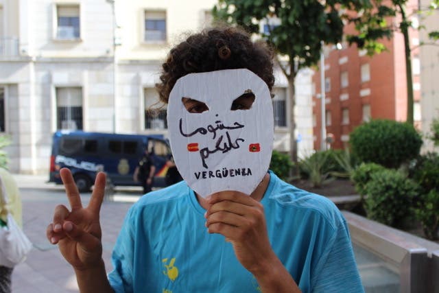 <p>A protestor at a demonstration for migrants’ rights in Cueta in July</p>