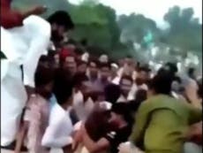 Outrage in Pakistan after hundreds of men crowd female TikToker, tearing her clothes