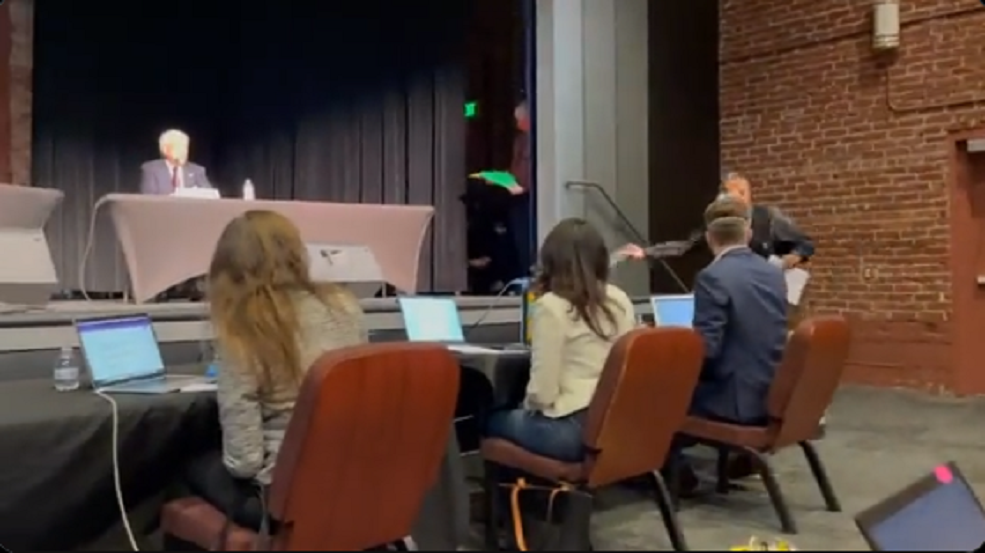 John Cox, a Republican running for governor in California, is served with a court order during a debate.