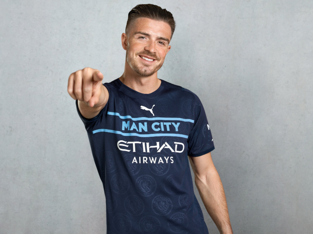 <p>New signing Jack Grealish models the divisive new Manchester City third kit</p>