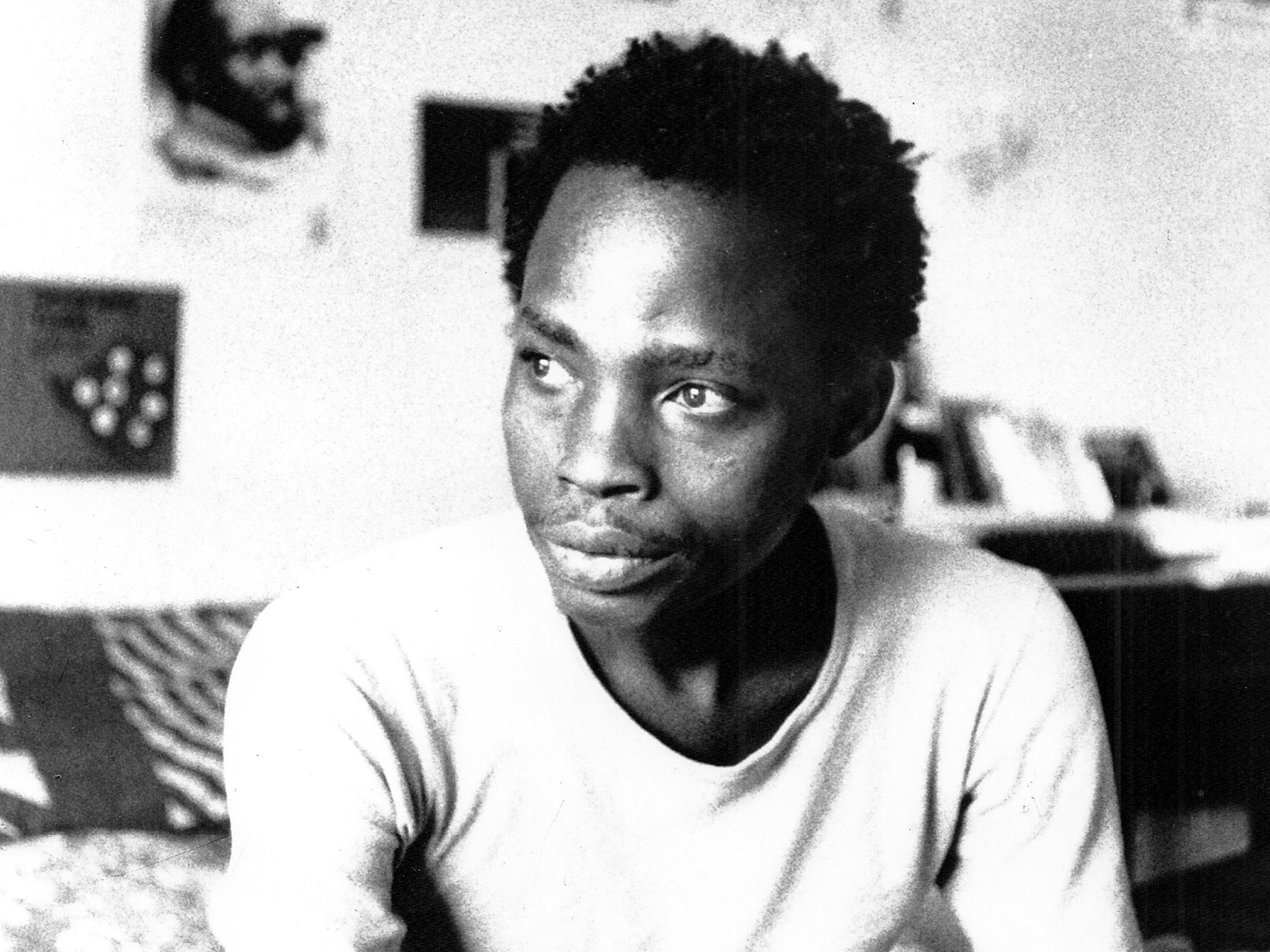 Dambudzo Marechera in his flat at 8 Sloane Court, Harare, possibly 1985