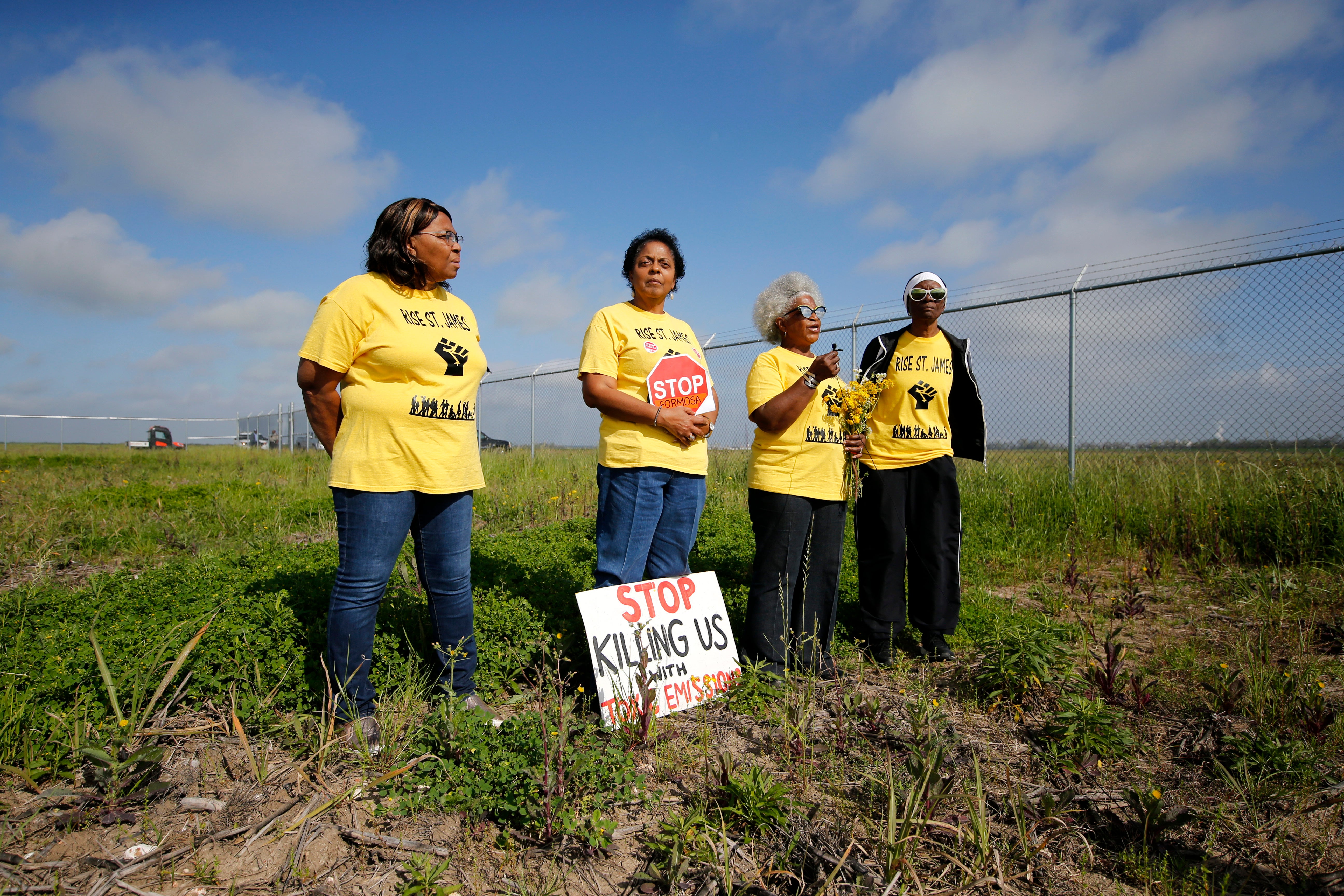 Myrtle Felton, Sharon Lavigne, Gail LeBoeuf and Rita Cooper of Rise St James hold a demonstration on property owned by Formosa in March 2020.