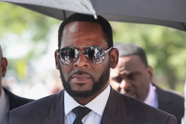 <p>R Kelly leaves the Leighton Criminal Courts Building following a hearing on 26 June 2019 in Chicago, Illinois</p>