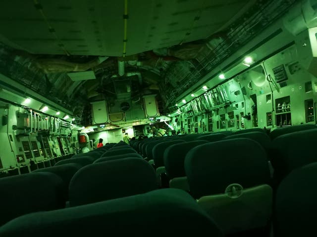 <p>Only a handful of passengers can be seen on a rescue flight leaving Afghanistan, in this image tweeted by Paul Farthing</p>