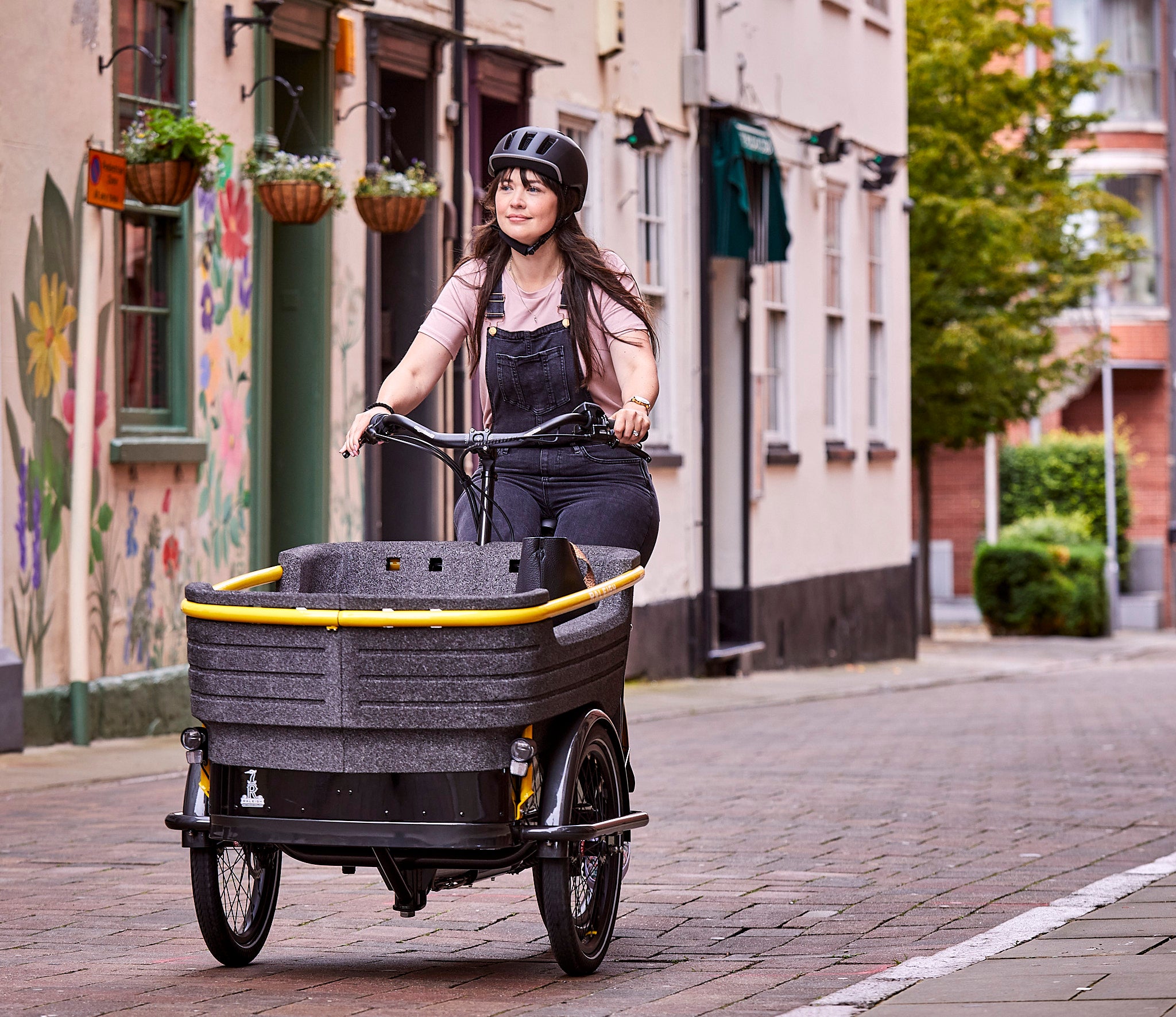Raleigh’s Stride 3 e-cargo bike resembles the cargo cycles that were once common