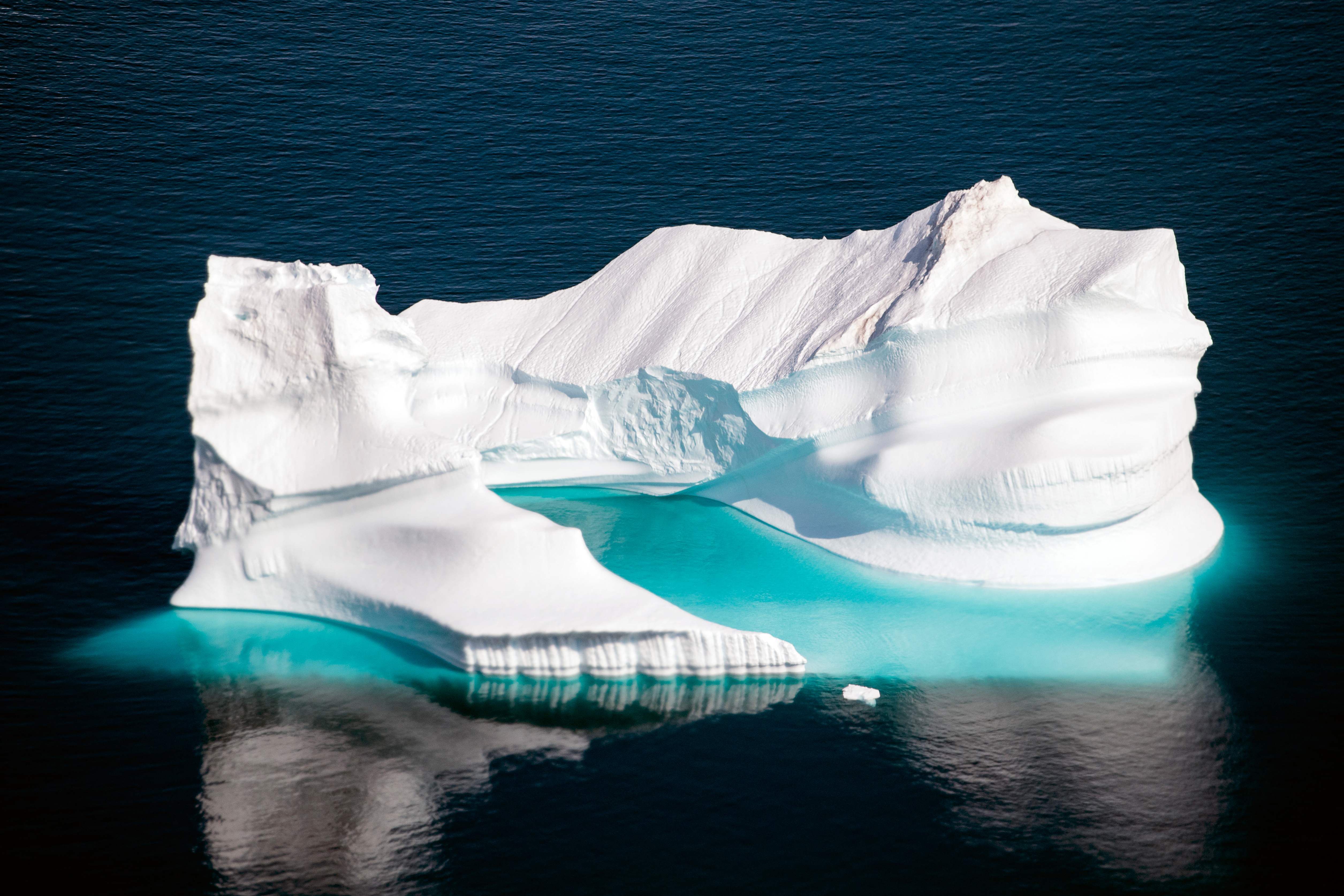 An iceberg floats along the eastern cost of Greenland near Kulusuk