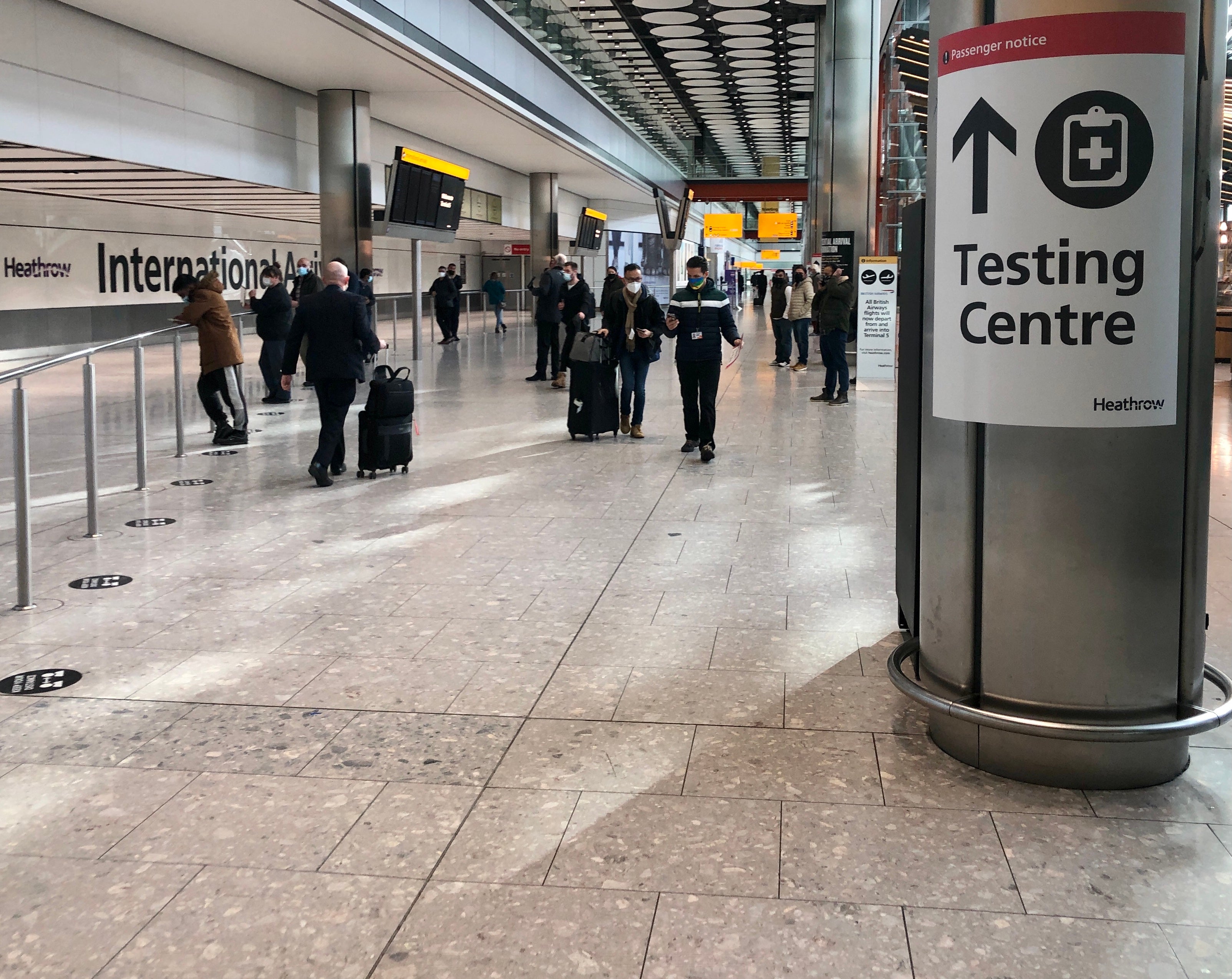 Signs indicate a testing centre at Heathrow Airport