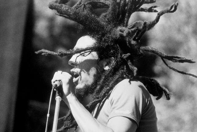 Bob Marley on stage (PA)