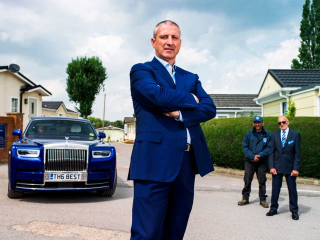 <p>Self-made millionaire Alfie Best at Wyldecrest Parks in Essex with his Rolls-Royce and park workers   </p>