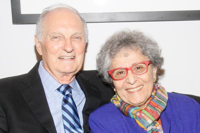 <p>Alan Alda and his wife Arlene, who first locked eyes over a rum cake, in 2014</p>
