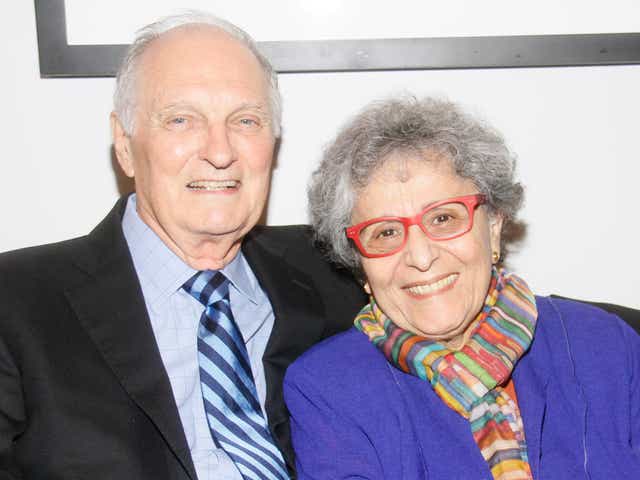 <p>Alan Alda and his wife Arlene, who first locked eyes over a rum cake, in 2014</p>