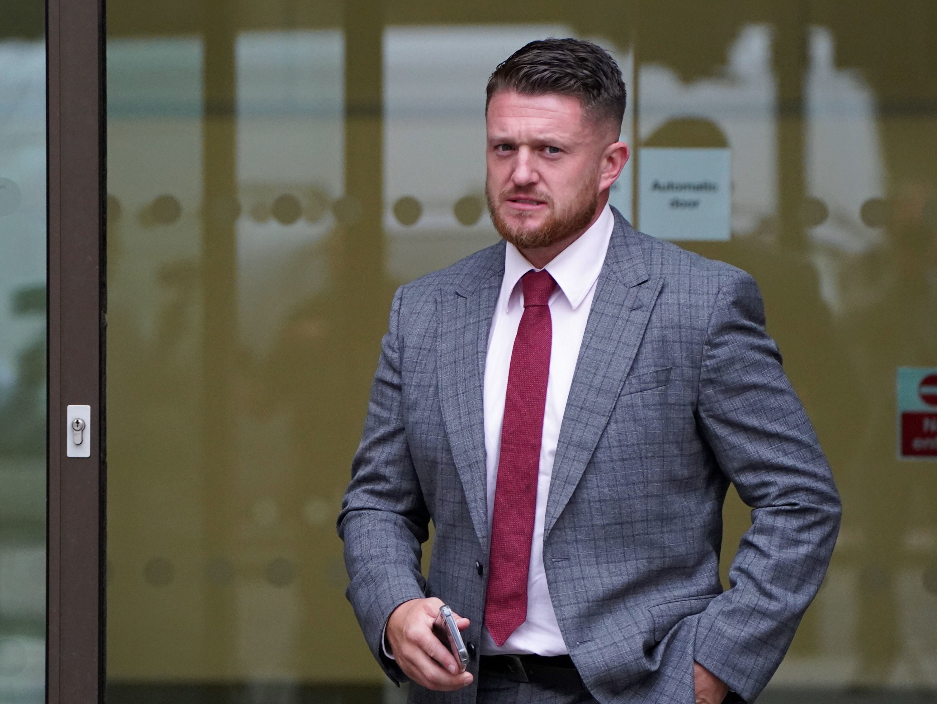 Tommy Robinson appeared in court accused of stalking Independent home affairs correspondent Lizzie Dearden