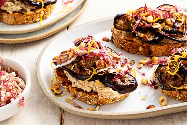 <p>Skordalia, a garlicky Greek spread of nuts, bread and potatoes, anchors these hearty toasts</p>