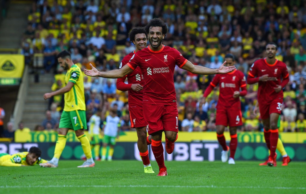 Salah celebrates after scoring Liverpool’s third goal at Carrow Road on the opening weekend of the Premier League season