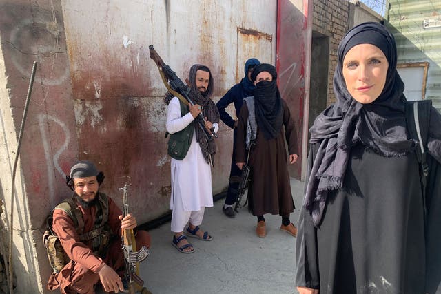 <p>This image provided by CNN shows the network’s Chief International Correspondent Clarissa Ward, right, reporting August of 2021 in Kabul, Afghanistan. </p>