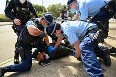 Hundreds arrested, fined during Australia lockdown protests