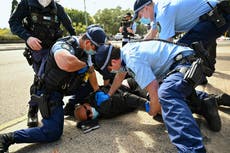 Hundreds arrested, fined during Australia lockdown protests