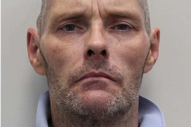 <p>Police released this image of Lee Peacock, 49, who they wish to speak to in connection with two murders </p>