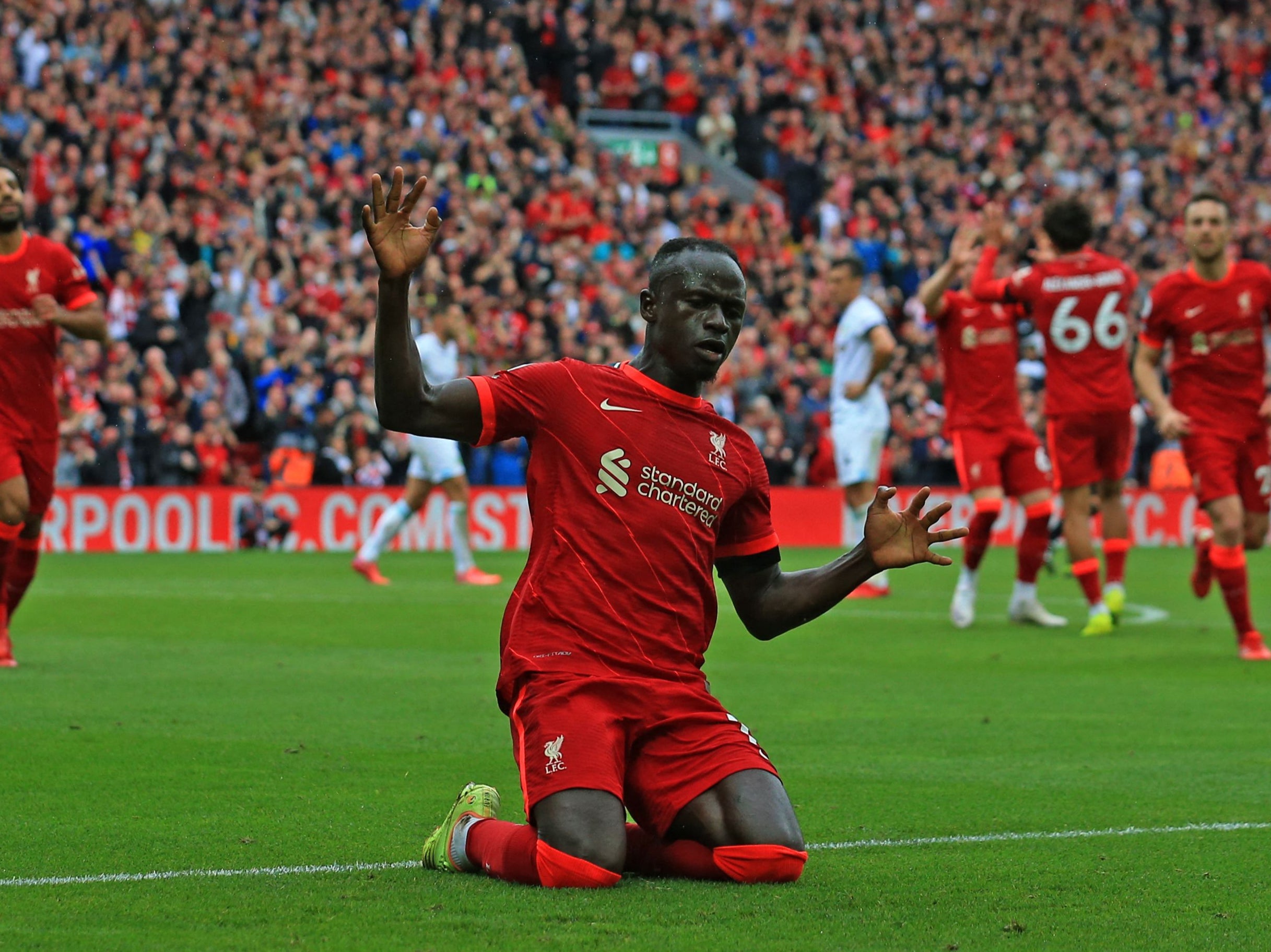 Sadio Mane celebrates scoring the second for Liverpool