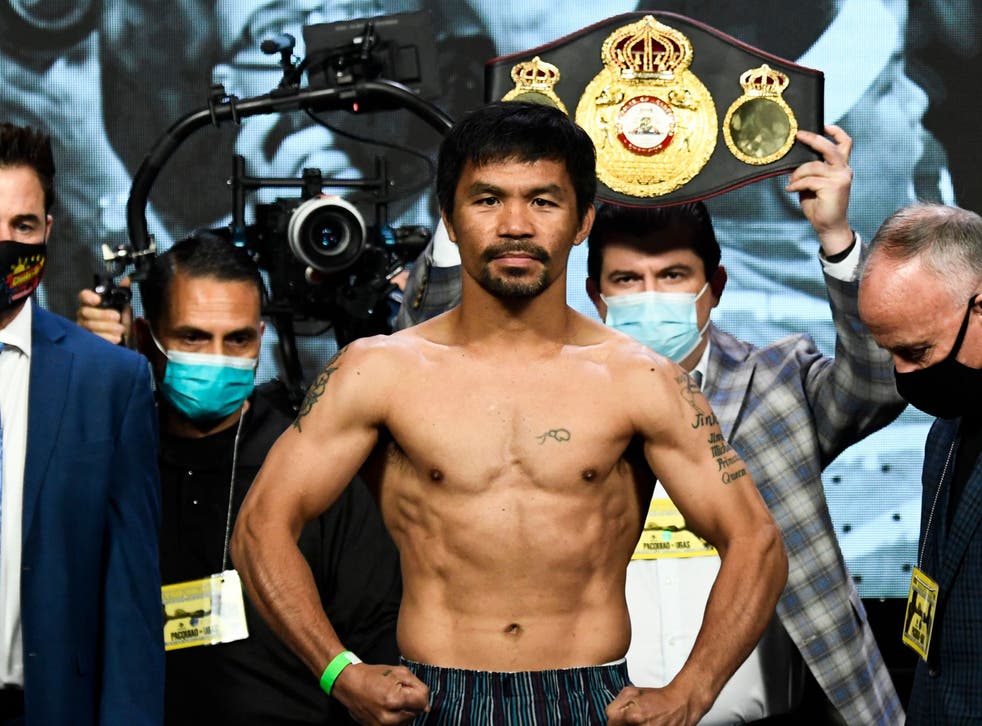 <p>Manny Pacquiao weighs-in before his fight against Yordenis Ugas </p>