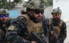 Taliban fighters show off US military uniforms, weapons in propaganda videos and on Afghan streets 