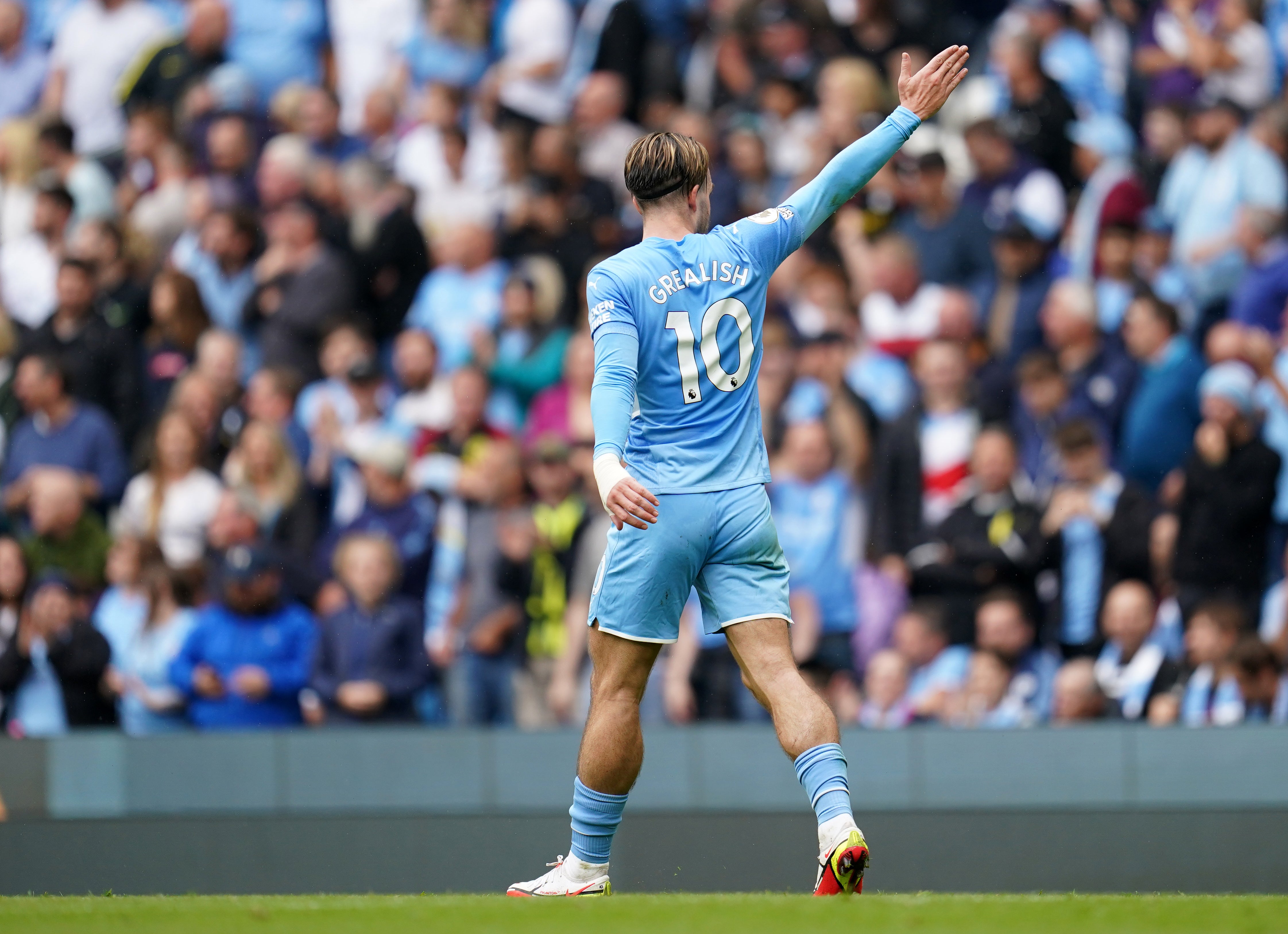 Jack Grealish acknowledges the Manchester City supporters after his first goal for his new club (Nick Potts/)