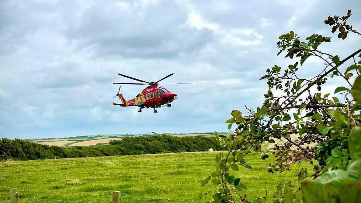 Cornwall Air Ambulance assisted in the rescue operations of the two individuals trapped under the boulders