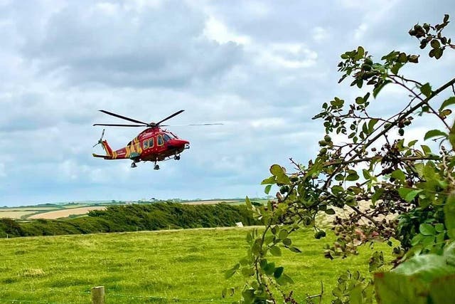 <p>Cornwall Air Ambulance assisted in the rescue operations of the two individuals trapped under the boulders  </p>