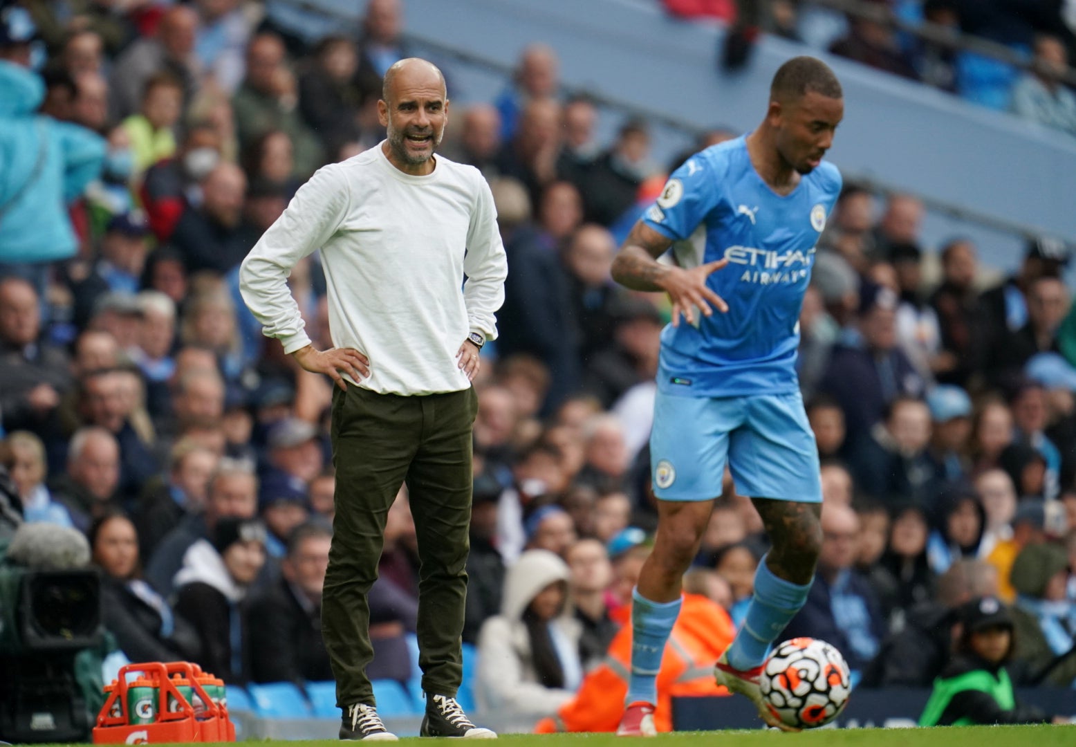 Pep Guardiola, left, does not know whether City will bring in a striker this summer (Nick Potts/PA)